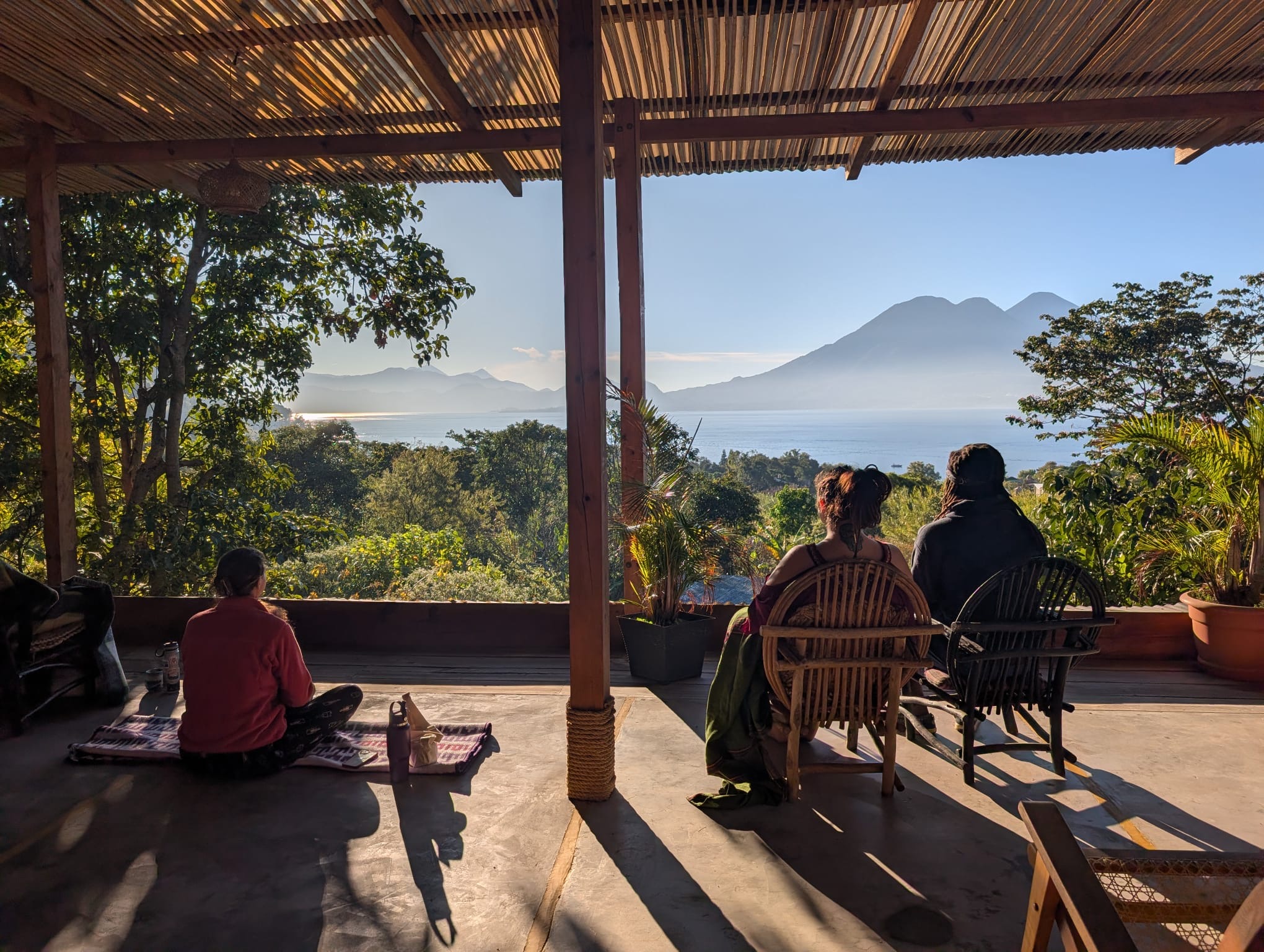 Satori and Tyrone Adekoya looking out over Lake Atitlán, Guatemala — the home and setting of The Cocoon Healing Retreat