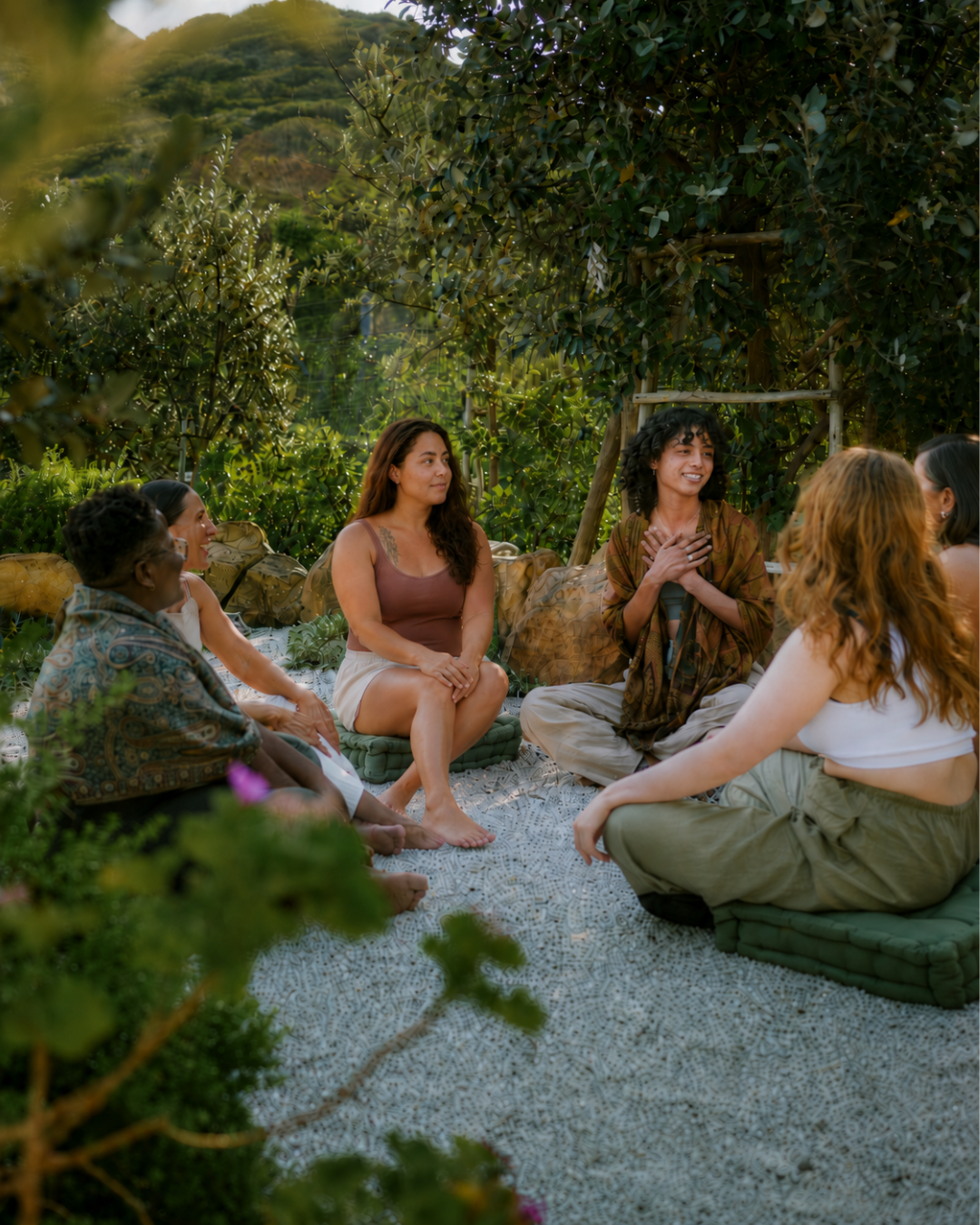 Butterfly 1 Tori sitting with six women in a healing circle at The Cocoon retreat